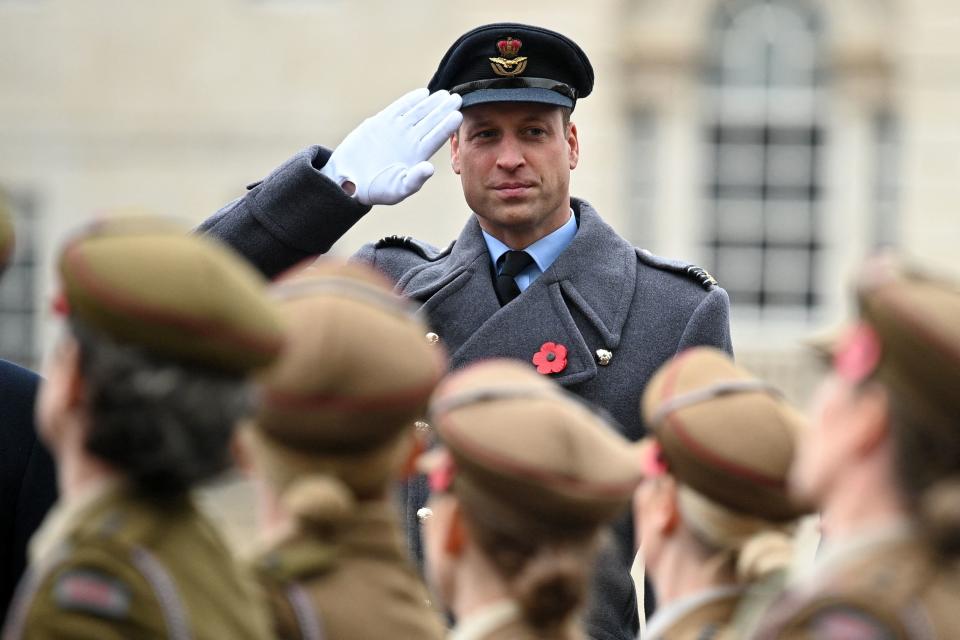 Britain's Prince William, Duke of Cambridge salutes veterans