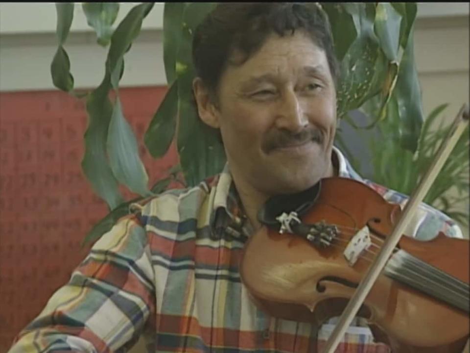 'Fiddler of the Arctic' Colin Adjun died on Friday morning, according to his family. He was 77. (CBC North - image credit)