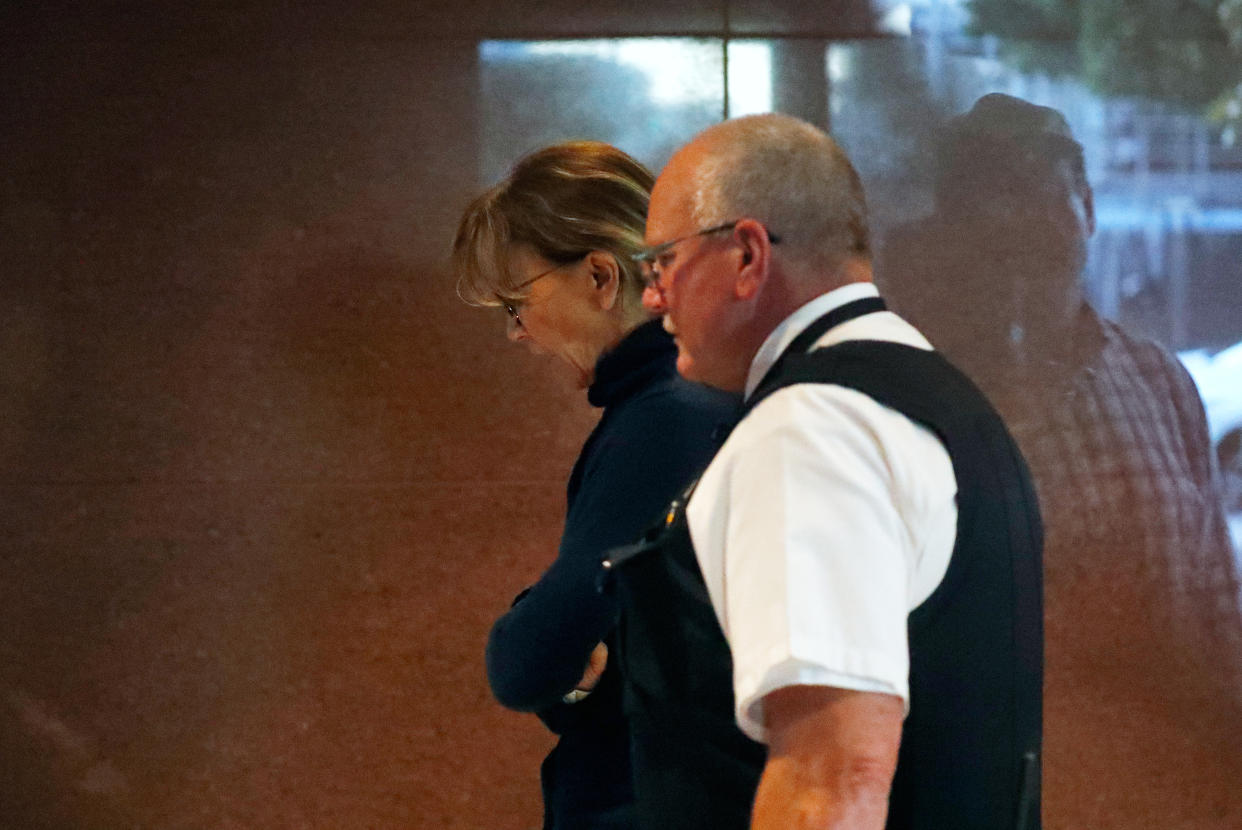 Felicity Huffman is seen departing an initial hearing for defendants in a racketeering case involving the allegedly fraudulent admission of children to elite universities. (Photo: REUTERS/Mike Blake)