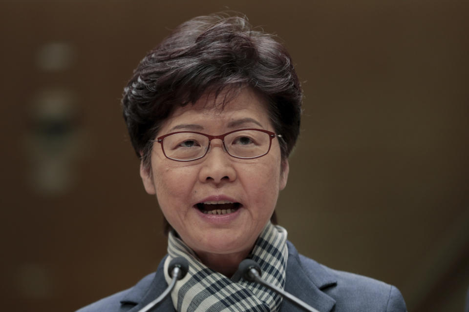 Hong Kong Chief Executive Carrie Lam speaks during a press conference in Hong Kong, Monday, Nov. 11, 2019. A protester was shot by police Monday in a dramatic scene caught on video as demonstrators blocked train lines and roads in a day of spiraling violence fueled by demands for democratic reforms. (AP Photo/Dita Alangkara)