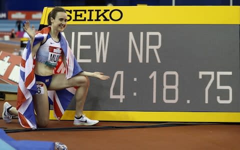 Laura Muir of Great Britain celebrates setting a new British Indoor record - Credit: Getty Images