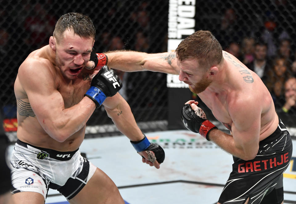NEW YORK, NEW YORK - NOVEMBER 06: (R-L) Justin Gaethje punches Michael Chandler in their lightweight fight during the UFC 268 event at Madison Square Garden on November 06, 2021 in New York City. (Photo by Jeff Bottari/Zuffa LLC)