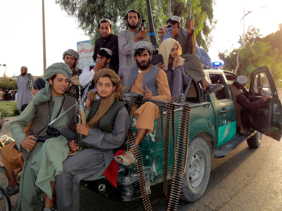 Taliban fighters patrol inside the city of Kandahar province southwest, of Afghanistan (Sidiqullah Khan/AP)