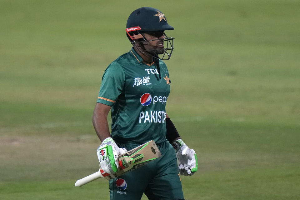 Pakistan's captain Babar Azam reacts as he leaves the field after losing his wicket during the T20 cricket match of Asia Cup between Pakistan and Afghanistan, in Sharjah, United Arab Emirates, Wednesday, Sept. 7, 2022. (AP Photo/Anjum Naveed)