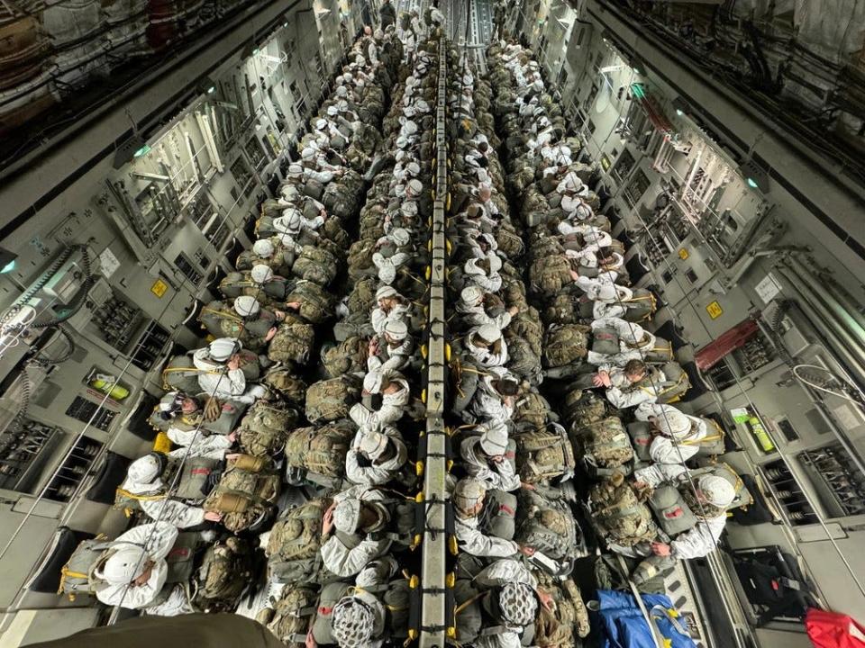 Paratroopers with 2nd Infantry Brigade Combat Team (Airborne), 11th Airborne Division, stage onboard a Boeing C-17 Globemaster III prior to conducting an airborne operation in Donnelly Training Area, Delta Junction, AK, Feb. 8, 2024.
