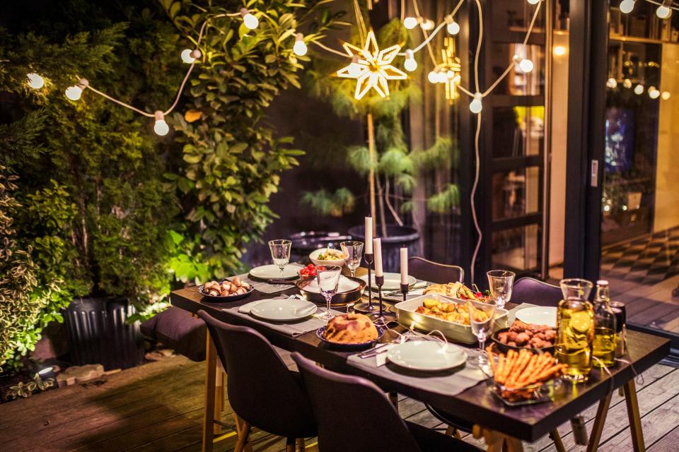 Hosting a dinner with friends? Move the party outside and transform your space into a themed getaway.