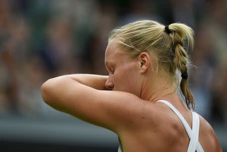 Britain Tennis - Wimbledon - All England Lawn Tennis & Croquet Club, Wimbledon, England - 2/7/16 Holland's Kiki Bertens reacts during her match against Romania's Simona Halep REUTERS/Toby Melville