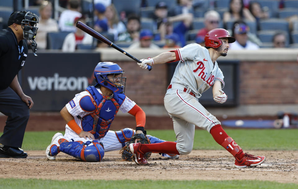 Phillies' Garrett Stubbs follows through on single against the New York Mets during the ninth inning of a baseball game, Sunday, Oct. 1, 2023, in New York. (AP Photo/Noah K. Murray)