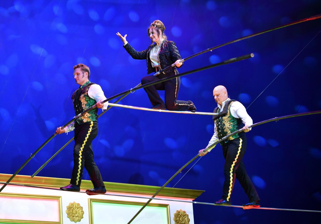 Delilah Wallenda, 71, performs on the high wire, with her nephew, Blake Wallenda, left, and son, Nik Wallenda, on Thursday night, Dec. 28, 2023, at the Circus Arts Conservatory "A Brave New Wonderland" show at University Town Center in Sarasota.