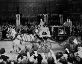 Britain's future Queen Elizabeth II and Prince Philip cheered by crowds after their wedding in 1947