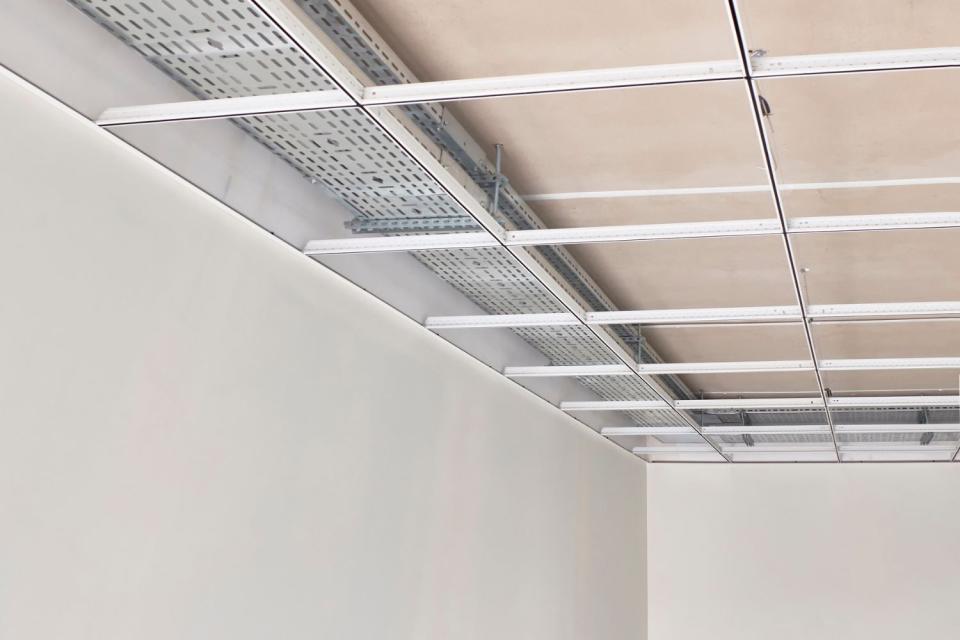 A close up of metal construction in a ceiling. 