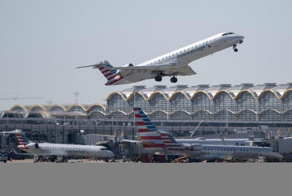 A regional American Airlines plane takes off from Ronald Reagan Washington National Airport in Arlington, Virginia on March 20, 2023. (Photo by ANDREW CABALLERO-REYNOLDS/AFP via Getty Images)