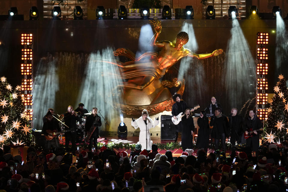 Kelly Clarkson performs before the lighting of a Christmas tree at Rockefeller Center in New York, Wednesday, Nov. 29, 2023. (AP Photo/Seth Wenig)