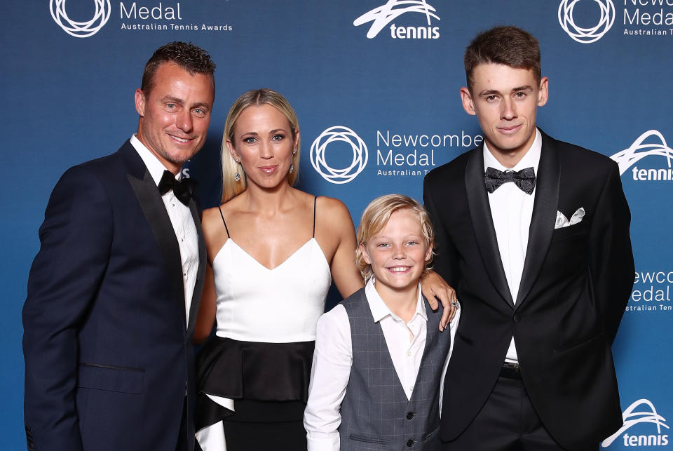 Lleyton Hewitt, pictured here with wife Bec and Alex de Minaur in 2018.