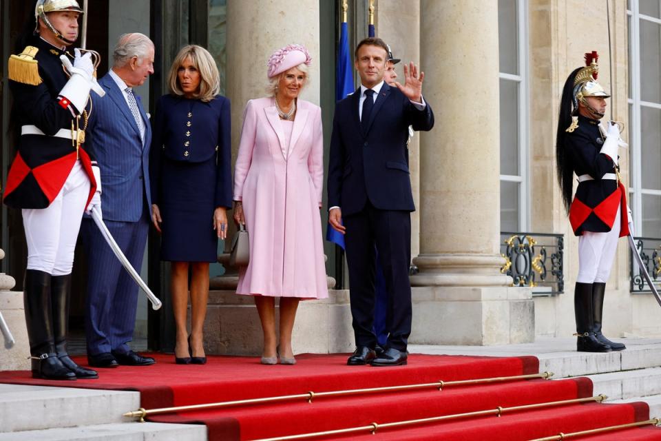 Emmanuel Macron, his wife Brigitte Macron, King Charles and Queen Camilla arrive for a meeting at the Elysee Palace in Paris (Reuters)