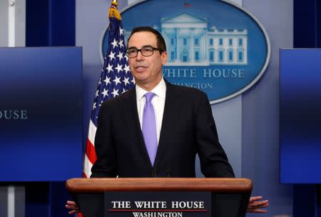 Treasury Secretary Steven Mnuchin speaks at a press briefing at the White House in Washington, U.S., February 14, 2017. REUTERS/Kevin Lamarque