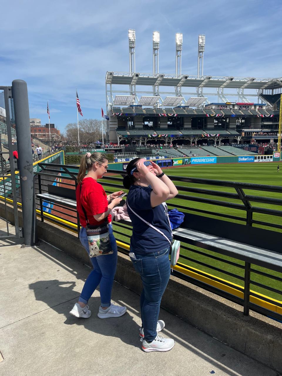 Sisters Tiffany, left, and Jasmine Nason drove up from Wooster to watch the eclipse at Progressive Field and were some of the first fans in the stadium.