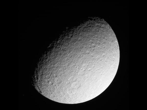 This raw image of Saturn's icy moon Rhea was taken on March 10, 2013 by NASA's Cassini spacecraft, and received on Earth March 10, 2013. The camera was pointing toward Rhea at approximately 174,181 miles (280,317 kilometers) away.