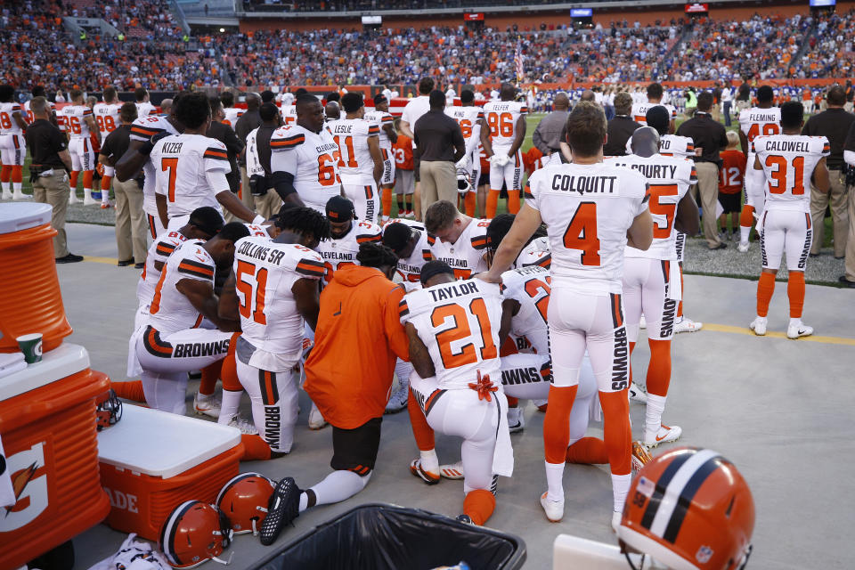 A group of Cleveland Browns players kneel in a circle in protest during the national anthem prior to a preseason game against the New York Giants at FirstEnergy Stadium on August 21, 2017 in Cleveland, Ohio. (Photo by Joe Robbins/Getty Images)