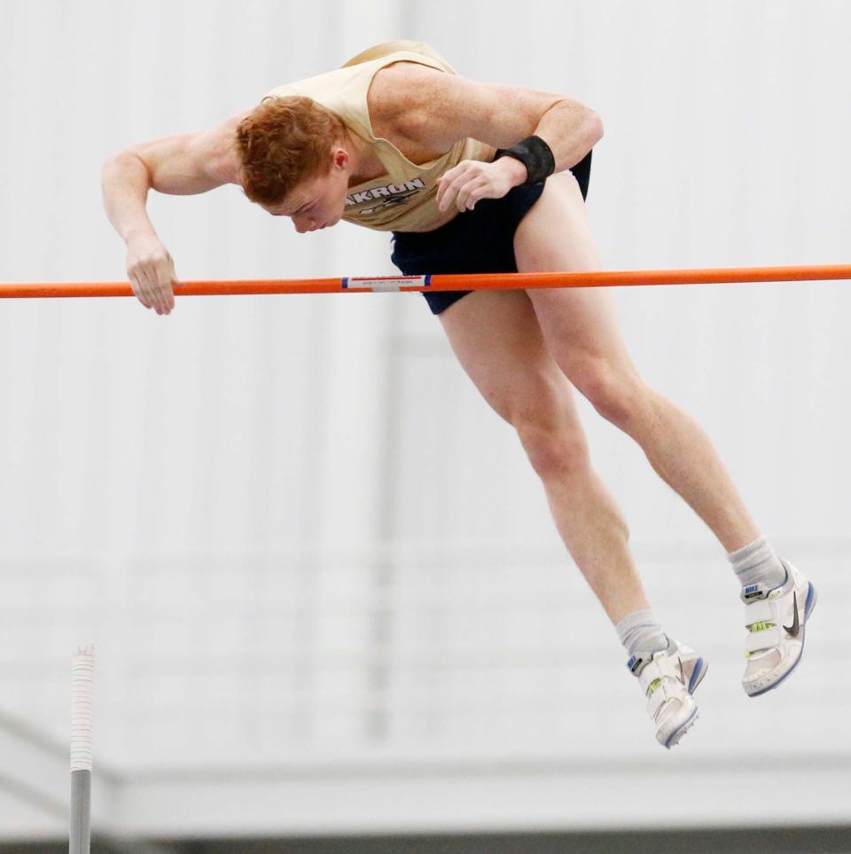 Akron's Shawn Barber clears 19 feet to win the Akron Pole Vault Convention Open in the Stile Field House.