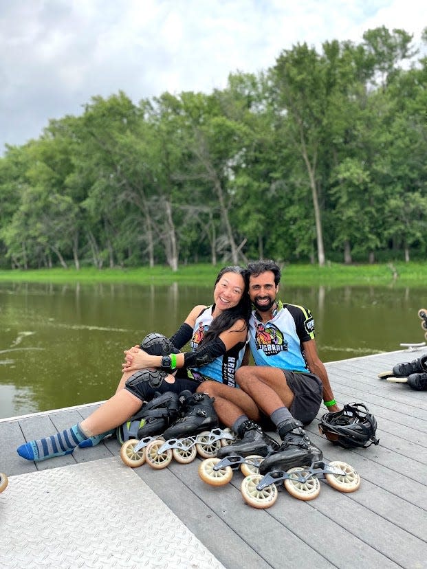 Jen Shyu and Arnav "Sonic" Shah at the end of RAGBRAI in 2021.