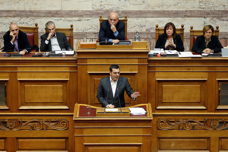 Greek Prime Minister Alexis Tsipras addresses lawmakers during a parliamentary session on confidence vote in Athens, Greece, January 15, 2019. REUTERS/Costas Baltas