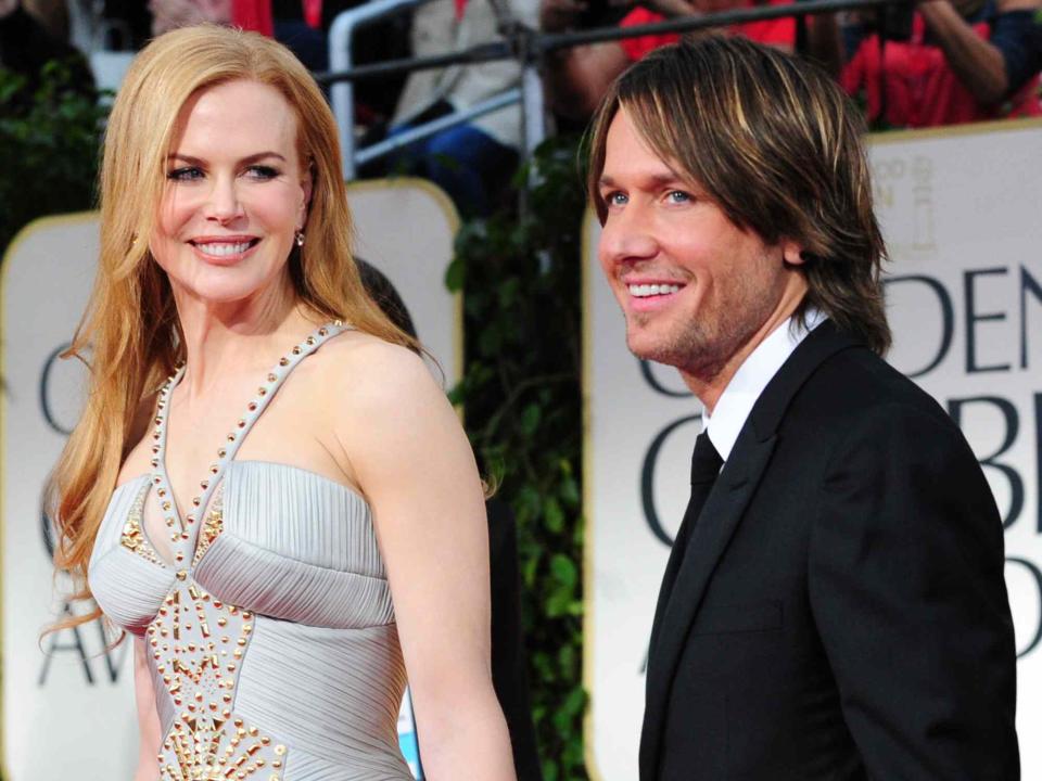 <p>FREDERIC J. BROWN/AFP via Getty </p> Nicole Kidman and Keith Urban at the 2012 Golden Globe Awards