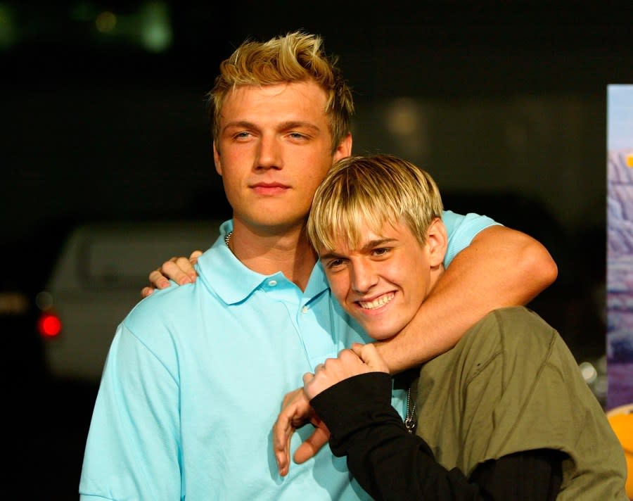 <em>Aaron and Nick Carter arrive for the “Simple Life 2” Welcome Home Party at the Spider Club on April 14, 2004, in Hollywood, California. (Frazer Harrison/Getty Images)</em>