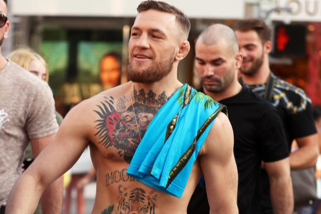 Conor McGregor Wears Louis Vuitton Slides and No Shirt to Shop in Beverly  Hills