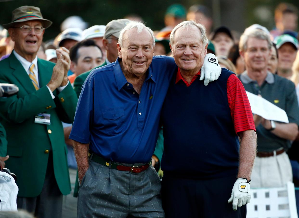 Honorary starters Arnold Palmer (left) and Jack Nicklaus (right) prepare to take their ceremonial tee shots during the first round of the Masters on April 9.