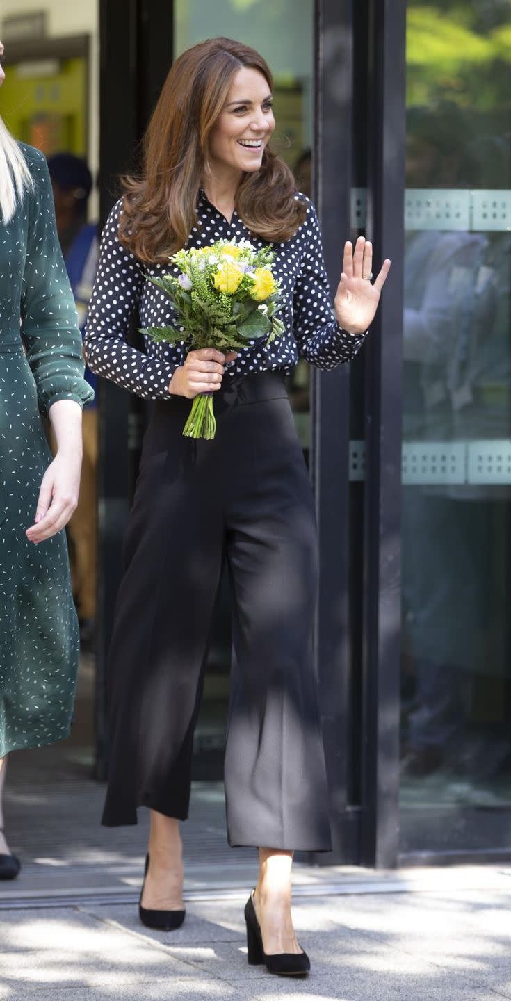 <p>Middleton paired a pretty black and white polka dot top with wide-leg black trousers and simple black pumps <a href="https://www.townandcountrymag.com/style/fashion-trends/a29122046/kate-middleton-polka-dot-blouse-evelina-london-outfit-photos/" rel="nofollow noopener" target="_blank" data-ylk="slk:at an event at the Sunshine House Children and Young People's Health and Development Centre in London;elm:context_link;itc:0;sec:content-canvas" class="link ">at an event at the Sunshine House Children and Young People's Health and Development Centre in London</a>.</p>