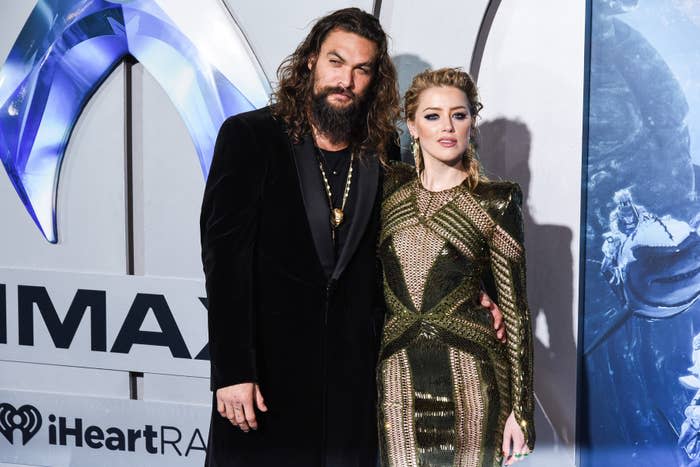 A closeup of Jason Momoa and Amber Heard during the movie's premiere