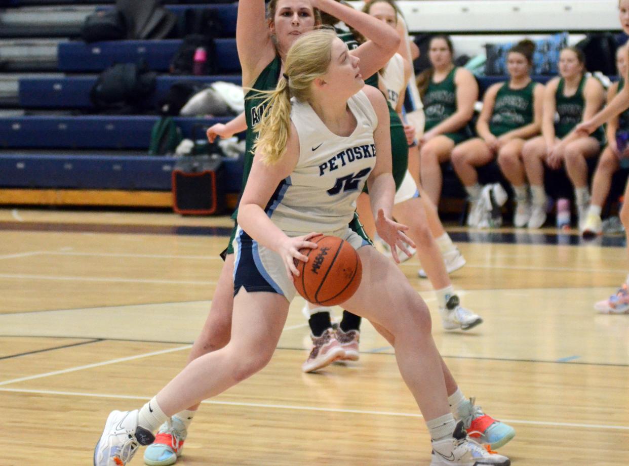 Petoskey's Lia Trudeau drives to the basket during the first half of action against Alpena Friday night.