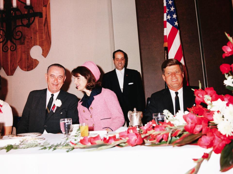 Vice President Lyndon B. Johnson, Jacqueline Kennedy, and President John F. Kennedy at a breakfast in Ft. Worth, Texas, on the morning the president was assassinated