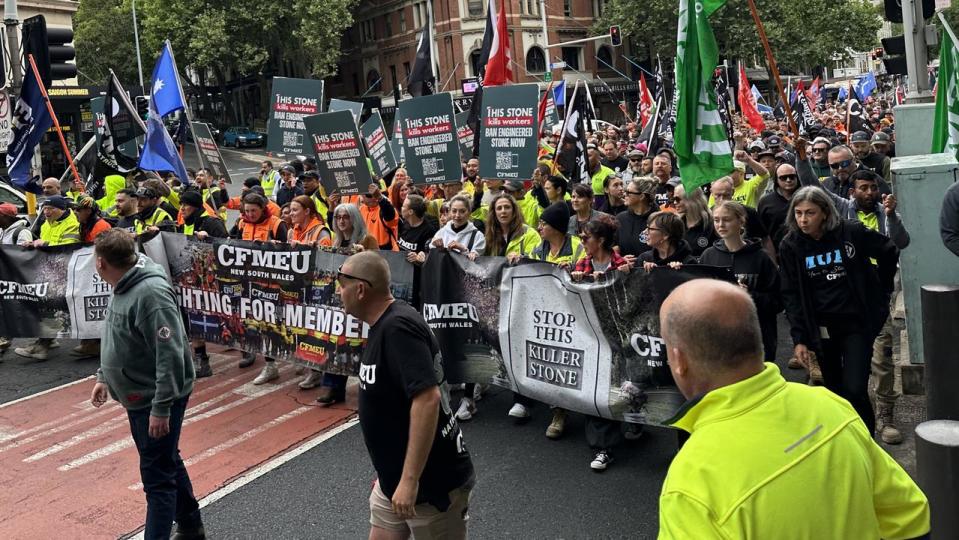 CFMEU workers march in Sydney, demanding a ban on engineered stone products. Picture: Supplied