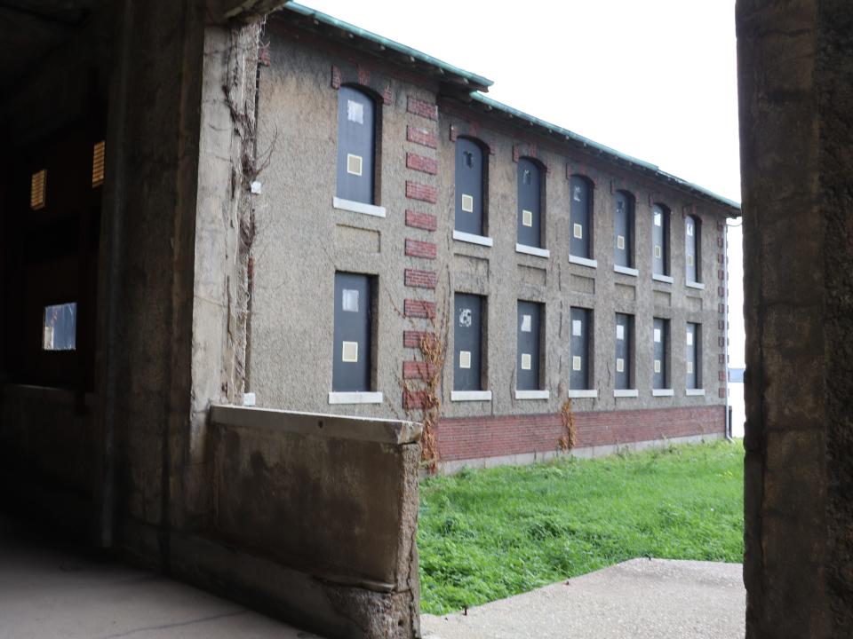 missing wall and windows at the ellis island hospital