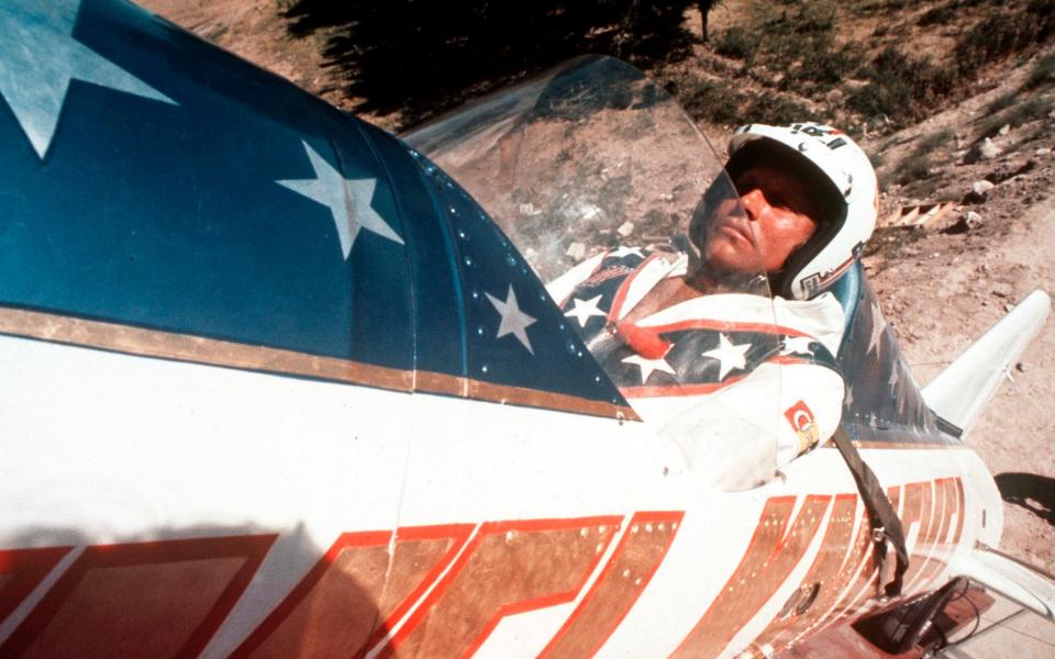 The character was dressed in a white helmet and jumpsuit, a look made famous by Evel Knievel - Anonymous/AP