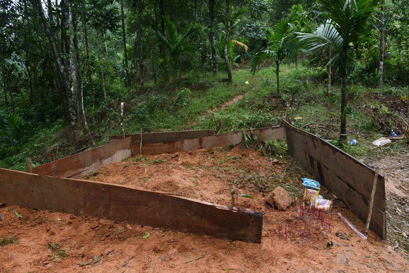 A makeshift grave for landslide victims is seen in Nam Tra My district