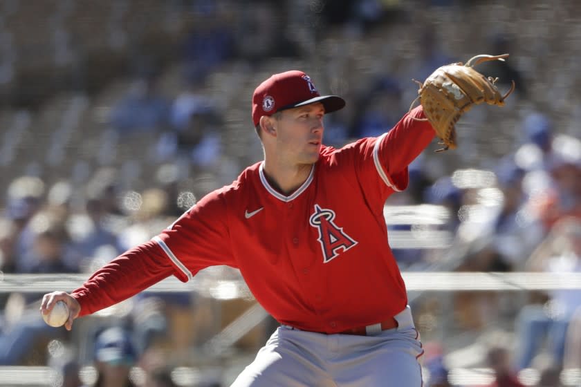 Los Angeles Angels starting pitcher Griffin Canning works against a Los Angeles Dodgers batter.