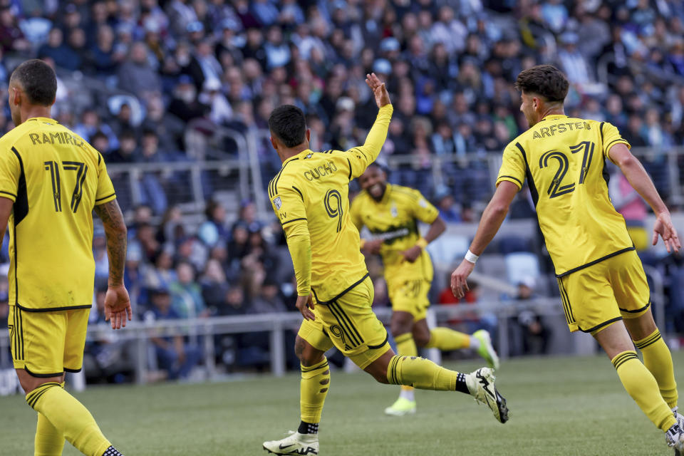 Columbus Crew forward Cucho Hernández (9) reacts after scoring a goal against the Minnesota United during the second half of an MLS soccer match, Saturday, March 2, 2024, in St. Paul, Minn. The game ended in a 1-1 draw. (AP Photo/Stacy Bengs)
