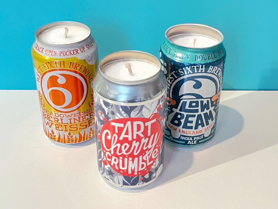Candles using recycled West Sixth Brewing cans, made by Nerd Babes Co., are for sale at Revelry Boutique and Gallery in Nulu.
