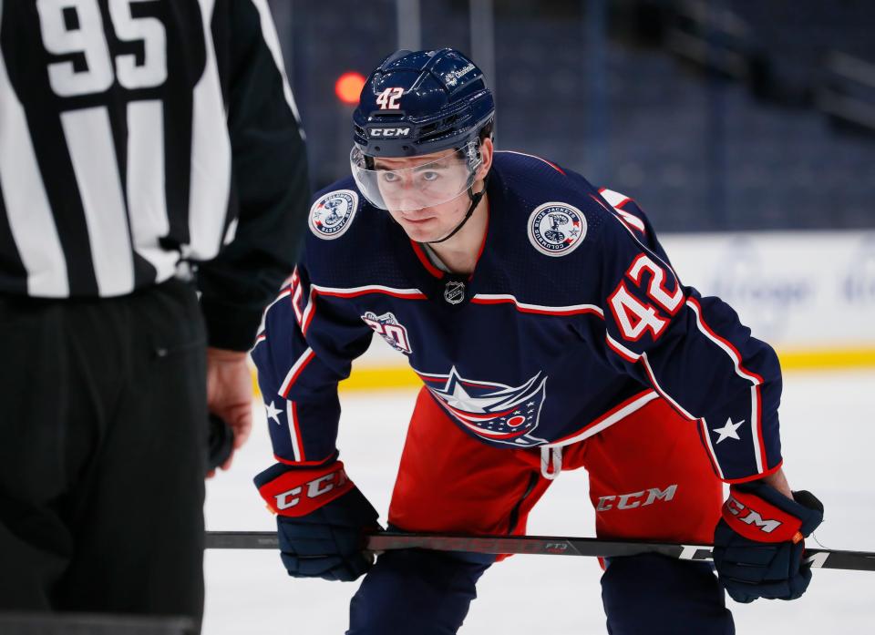 Columbus Blue Jackets center Alexandre Texier (42) lines up for a face-off during the third period of the NHL hockey game against the Chicago Blackhawks at Nationwide Arena in Columbus on Thursday, Feb. 25, 2021. The Blue Jackets lost 2-0.