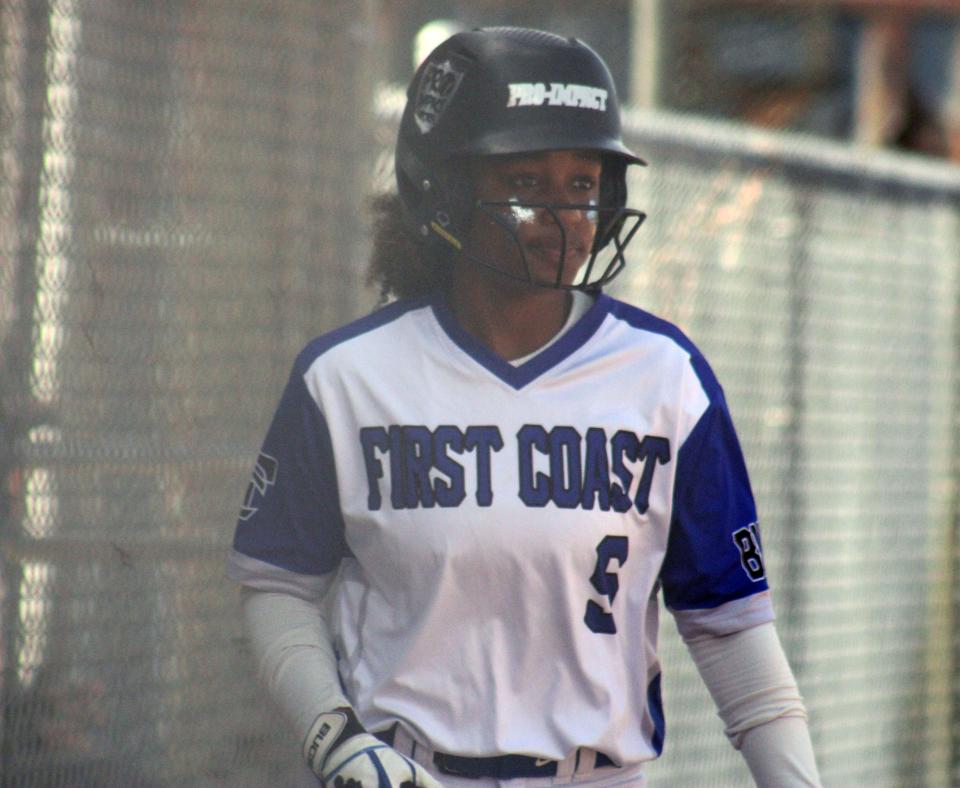 First Coast infielder Wisdom Colbert (5) prepares to swing in the on-deck circle during a Gateway Conference high school softball game against Jackson on April 20.