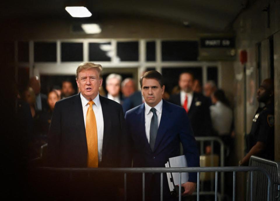 Donald Trump and his attorney Todd Blanche address reporters on May 21. (POOL/AFP via Getty Images)