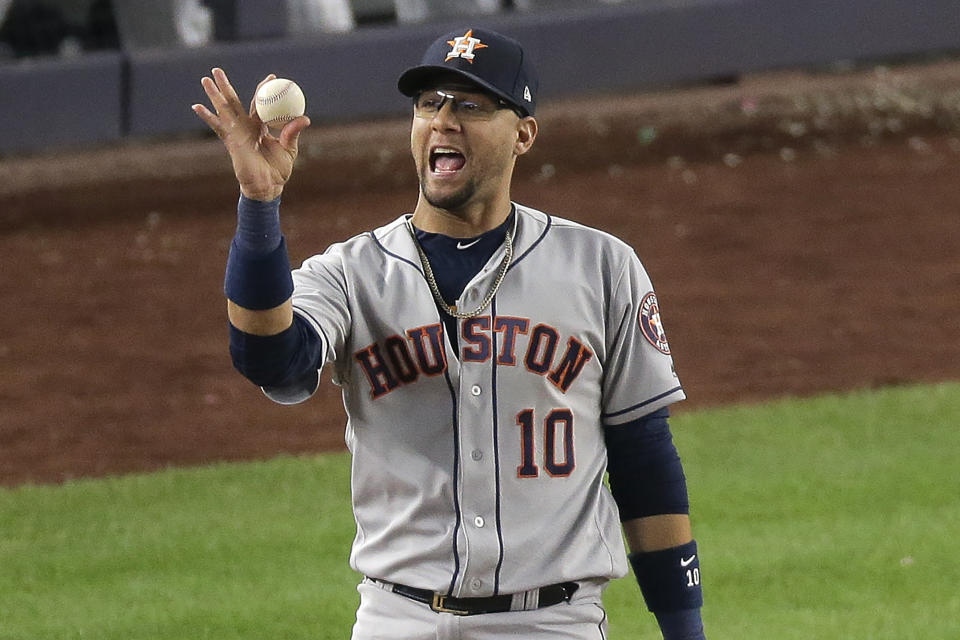 Houston Astros first baseman Yuli Gurriel (10) reacts after making the play at first for the third out to end Game 3 of baseball's American League Championship Series against the New York Yankees, Tuesday, Oct. 15, 2019, in New York. The Astros won 4-1.(AP Photo/Seth Wenig)