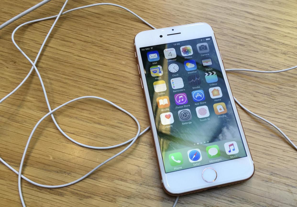 An iPhone is displayed in a store in London: Reuters