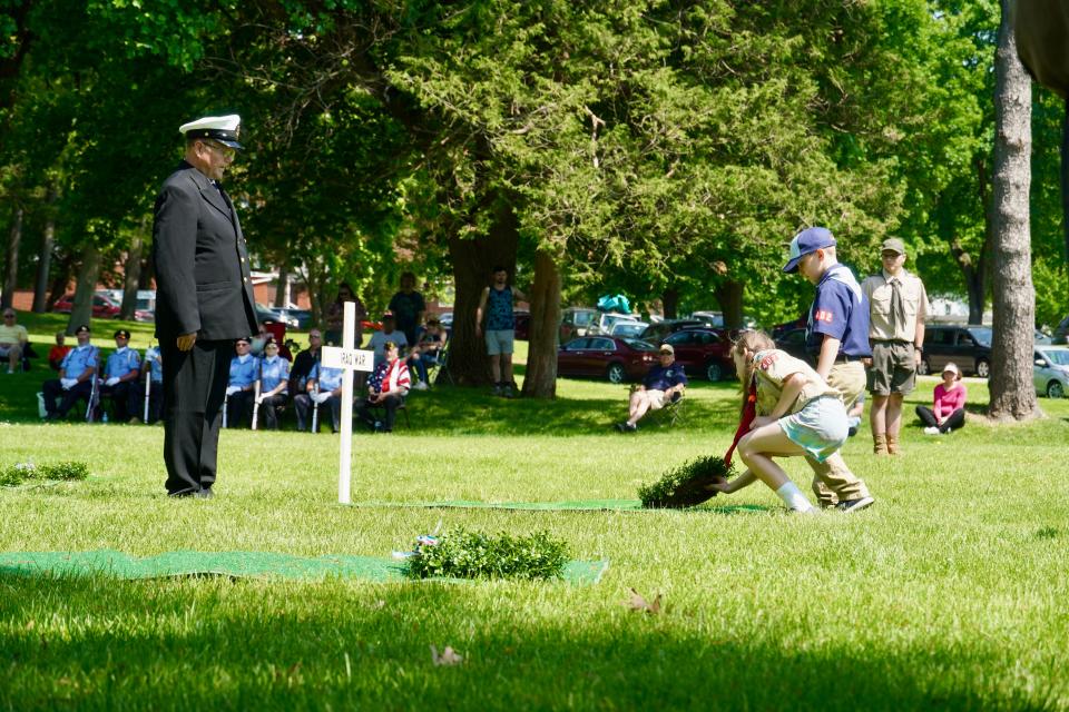 Boy Scouts and Girl Scouts helped with Monday's ceremony.