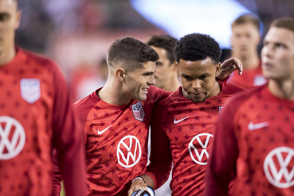 Christian Pulisic (left), Weston McKennie and the USMNT's loaded young roster is finally in camp together for friendlies in Europe this week and next. (Photo by Ira L. Black/Corbis via Getty Images)