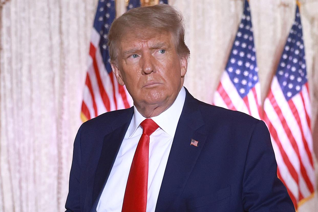 Former U.S. President Donald Trump leaves the stage after speaking during an event at his Mar-a-Lago home