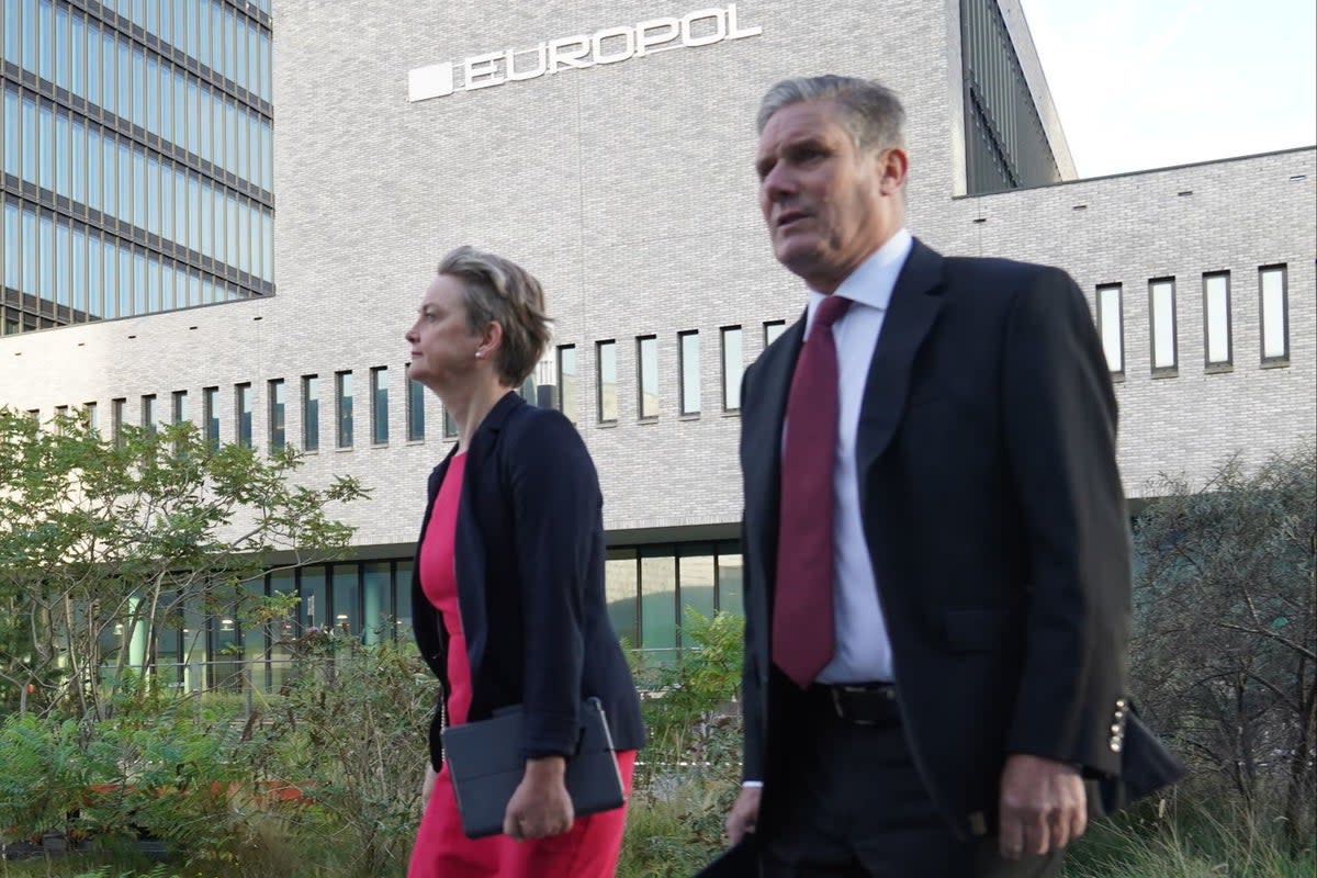 Labour leader Sir Keir Starmer and shadow home secretary Yvette Cooper arriving at Europol in The Hague on Thursday  (PA)